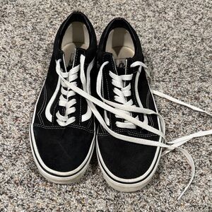 Vans Black Low-Top Sneakers with White Sole and Red Logo